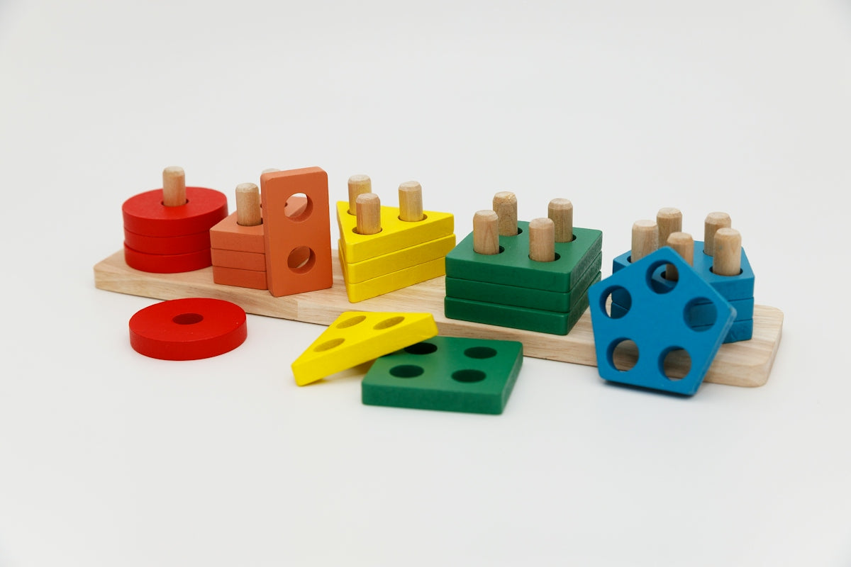 Wooden shape sorter toy with colorful blocks