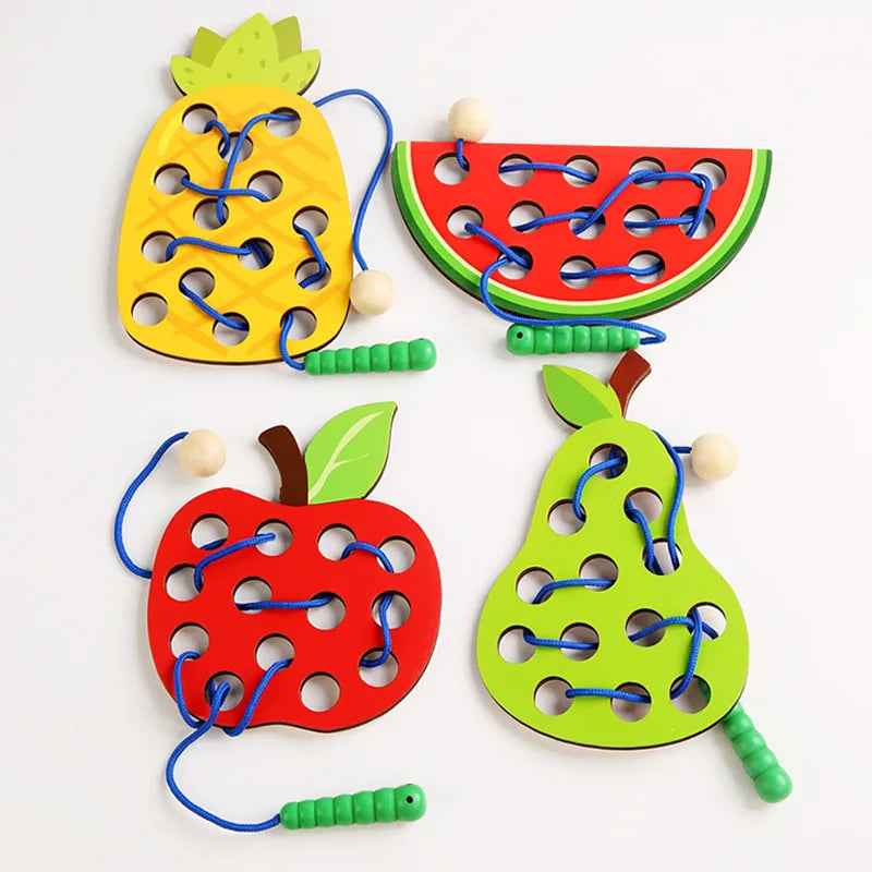Wooden fruit threading board placed in Montessori early education threading game by eprolo